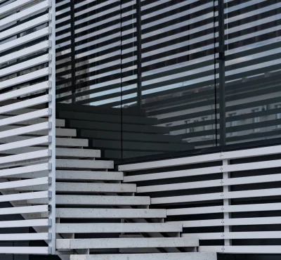 details-railing-stairs-modern-building-shadow-reflection-windows